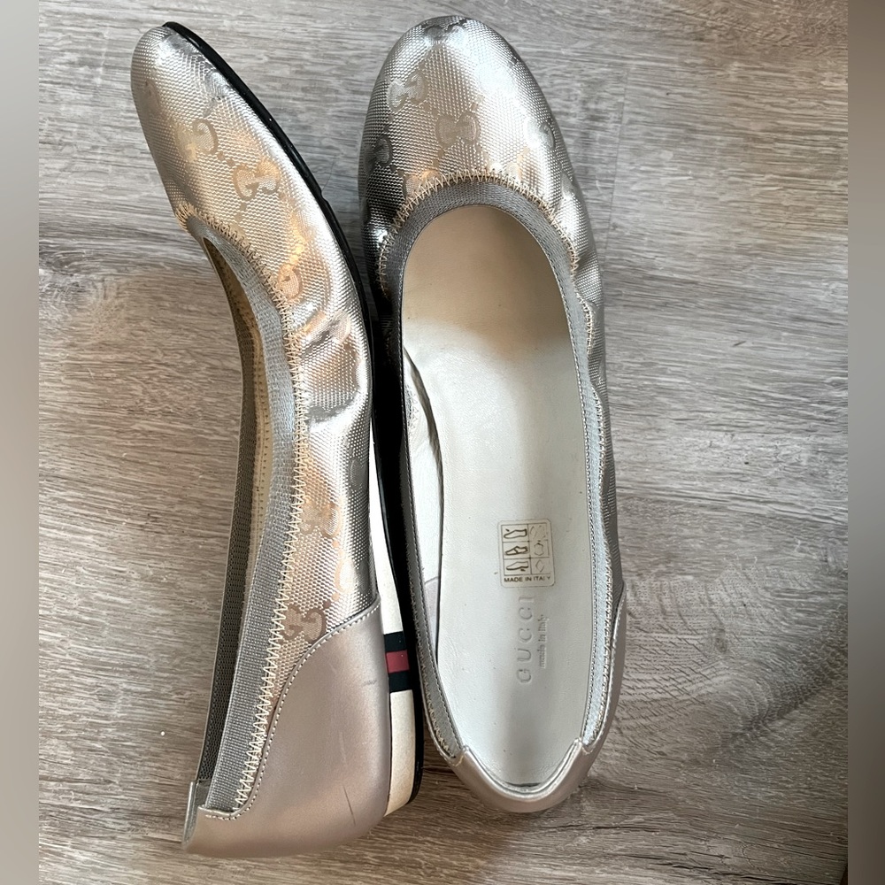Gucci silver ballerina flats.
